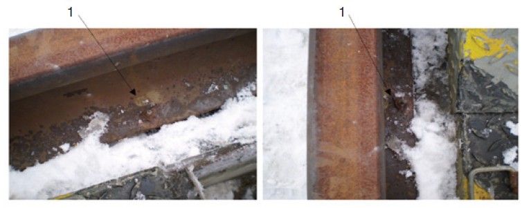 Obr. 15. Šroub přivařený ke kolejnici (1), který sloužil k propojení ochranného pospojování v pohledu z boku a shora