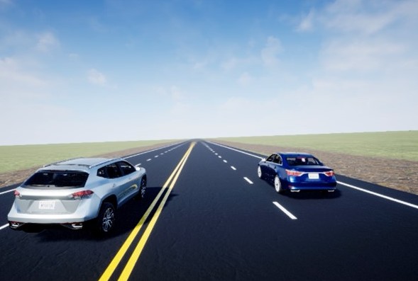 Obr. 3. Pohled na souběžnou jízdu stříbrného SUV a modrého sedanu se stejným pohonem, obě vozidla jsou simulována na suché silnici