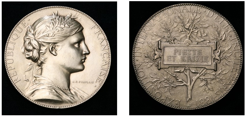 Zlatá medaile udělená F. Křižíkovi a Lud. Piette na I.mezinárodní elektrotechnické výstavě v Paříži 1881