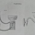 Obr. 8. Nástěnná ověsková svítidla, levé zdobené ženskou polopostavou, 20. až 30. léta 20. století (Státní okresní archiv Most)